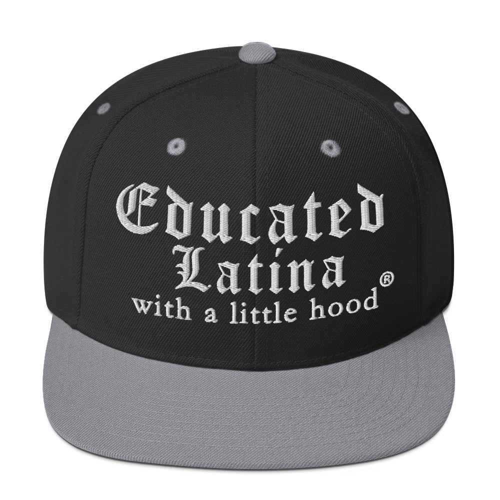 Educated Latina with a Little Hood snapback hat with strong jefa vibes