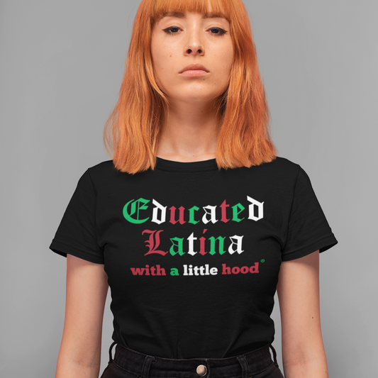 woman wearing a black t-shirt with red, green white 'Educated Latina with a little hood' text